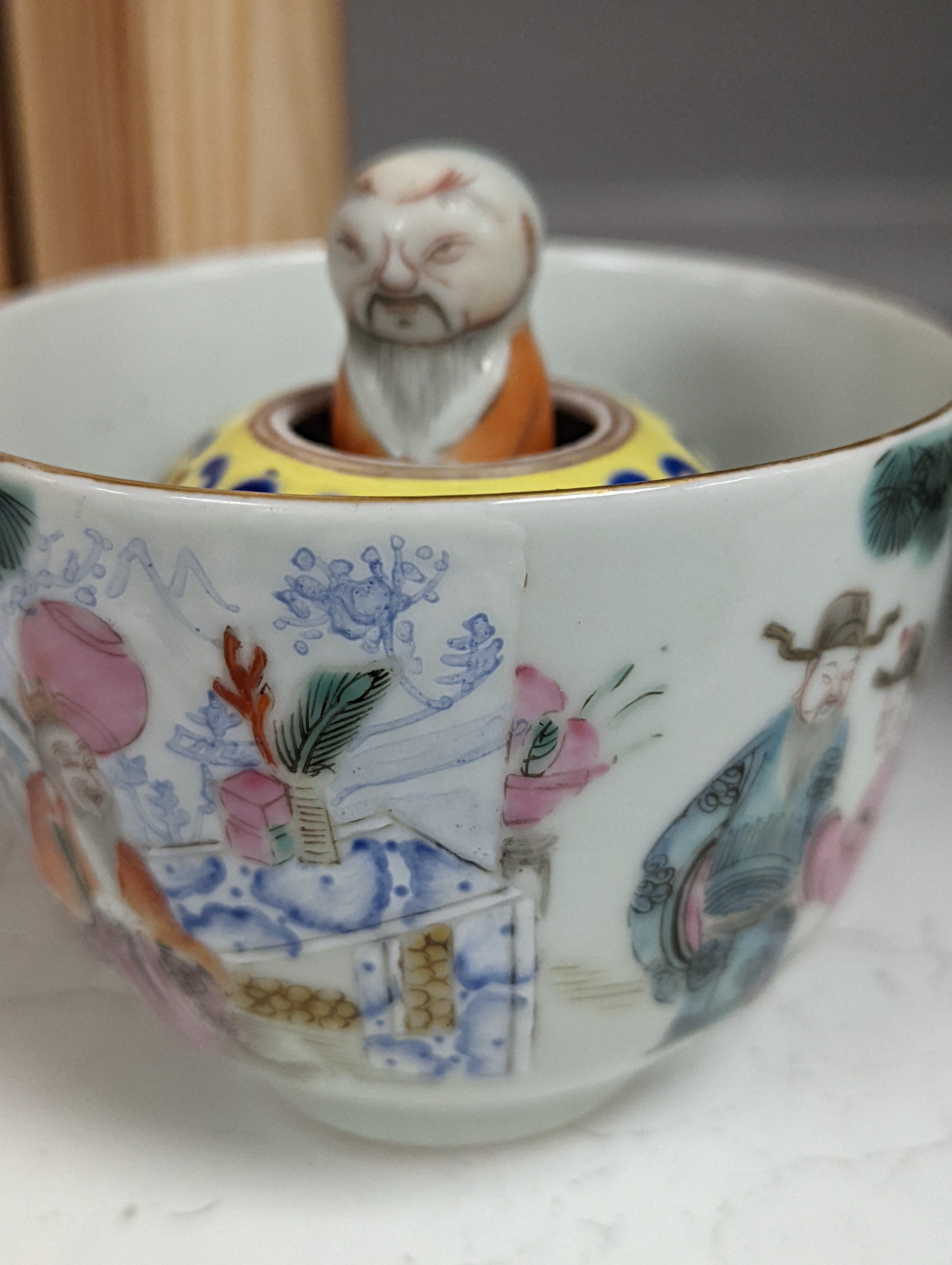 A Chinese famille rose puzzle cup, 8cm high
